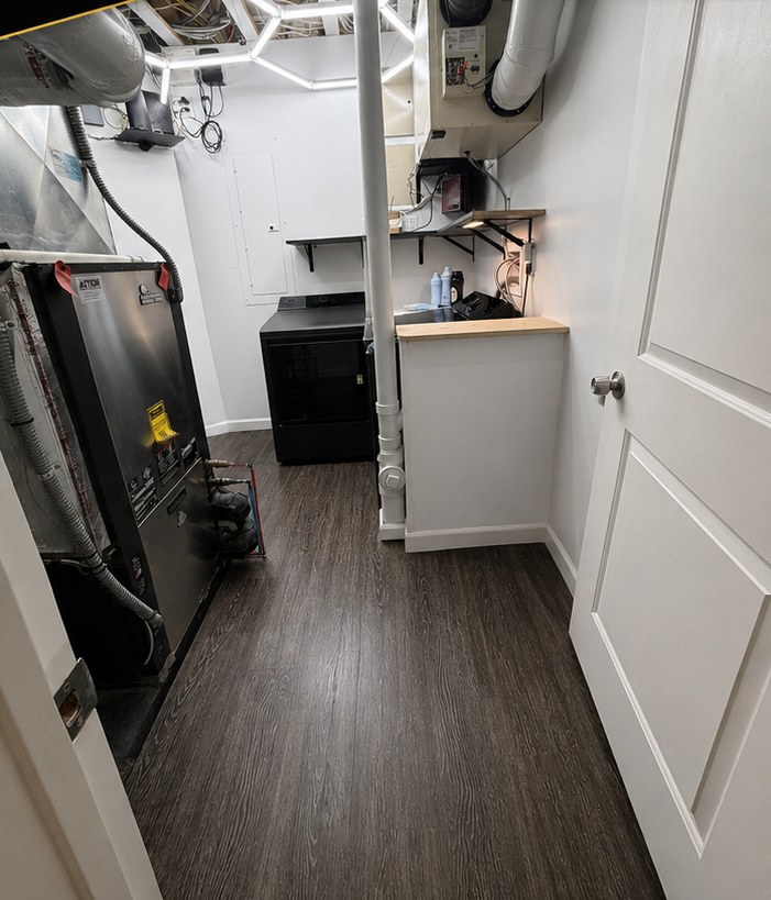 After Mechanical Room → Modern Laundry Room